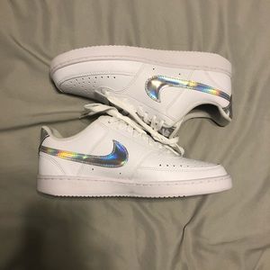 Nike sneakers with holographic swish